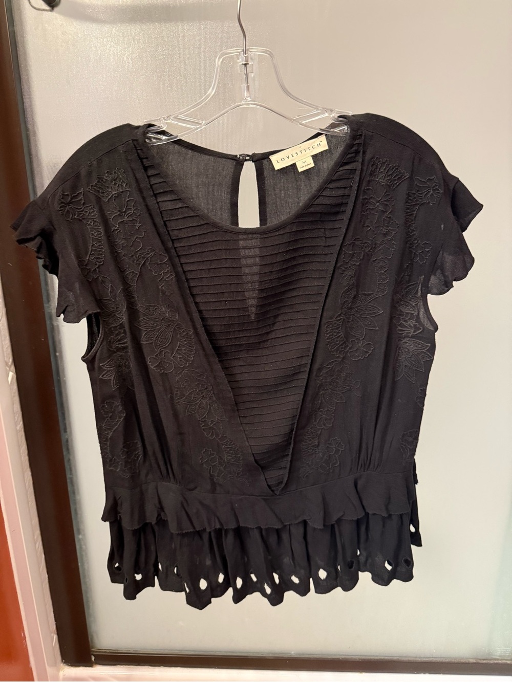 Love Stitch Black Embroidered V-Neck Ruffle Hem Blouse